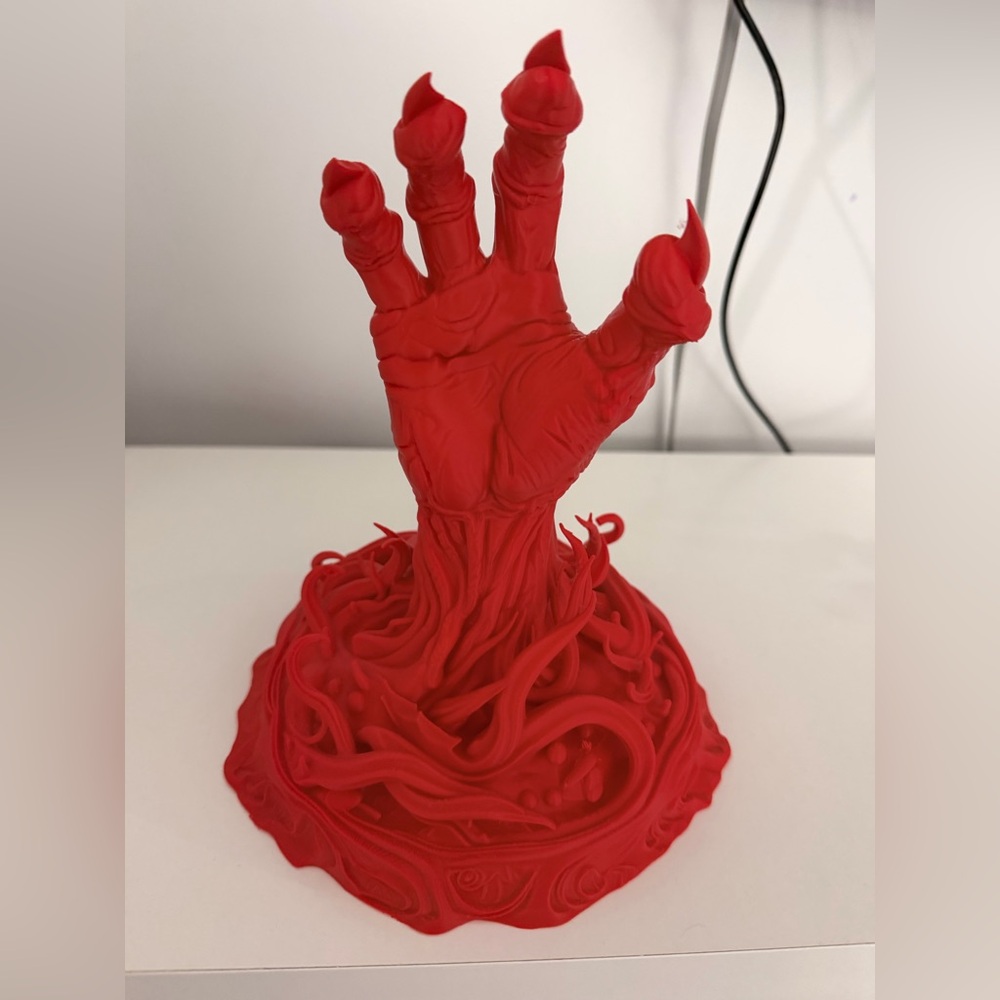 Red Demon Hand Figurine